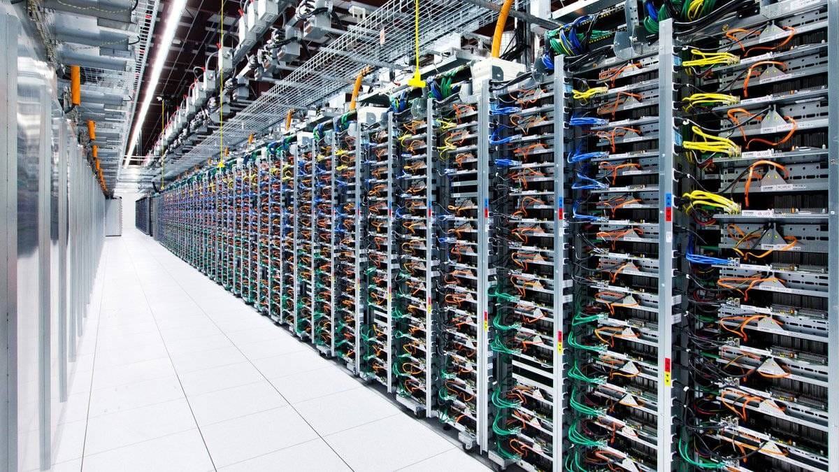 Enterprise AI data center server racks representing the AI infrastructure investment boom driving tech earnings