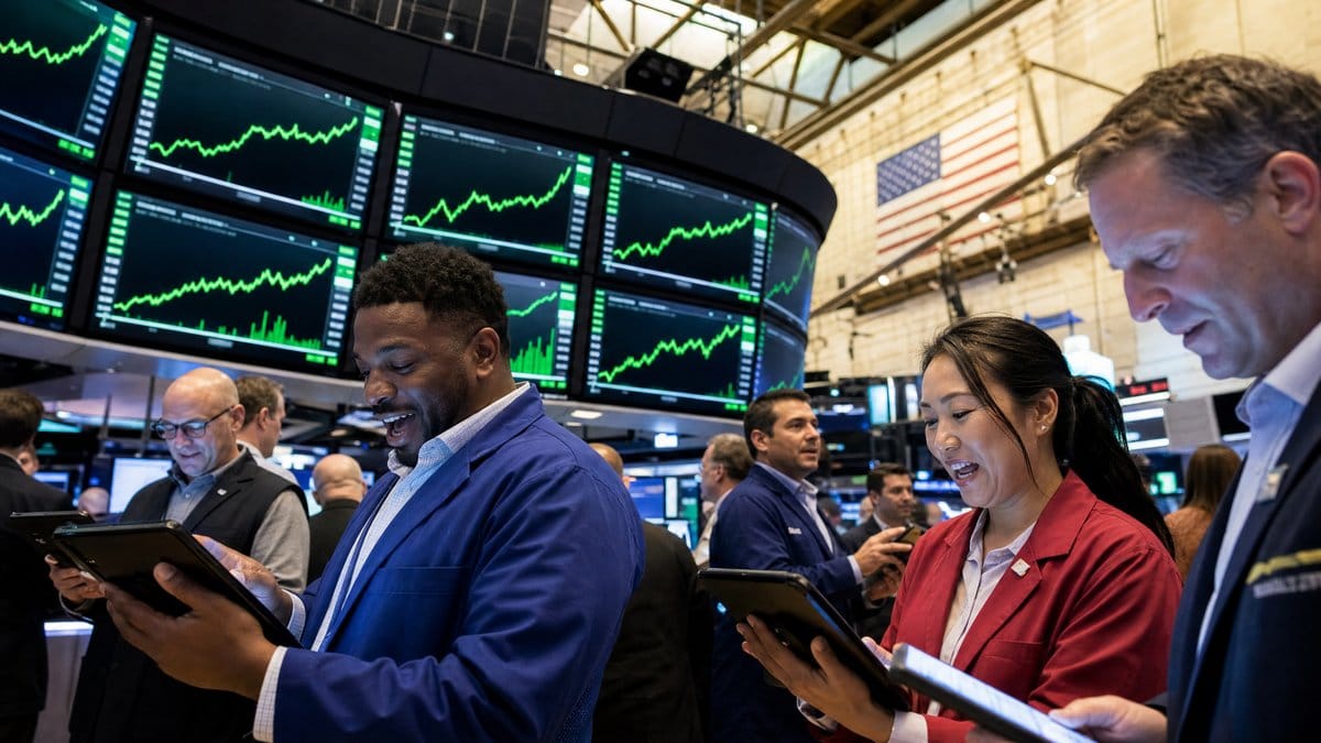Traders on the floor of the New York Stock Exchange celebrating as large screens show green upward-trending stock charts