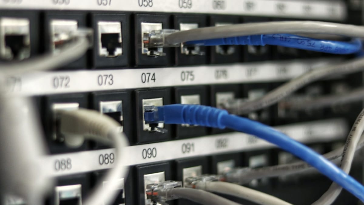 Enterprise networking infrastructure with fiber optic cables and server connections