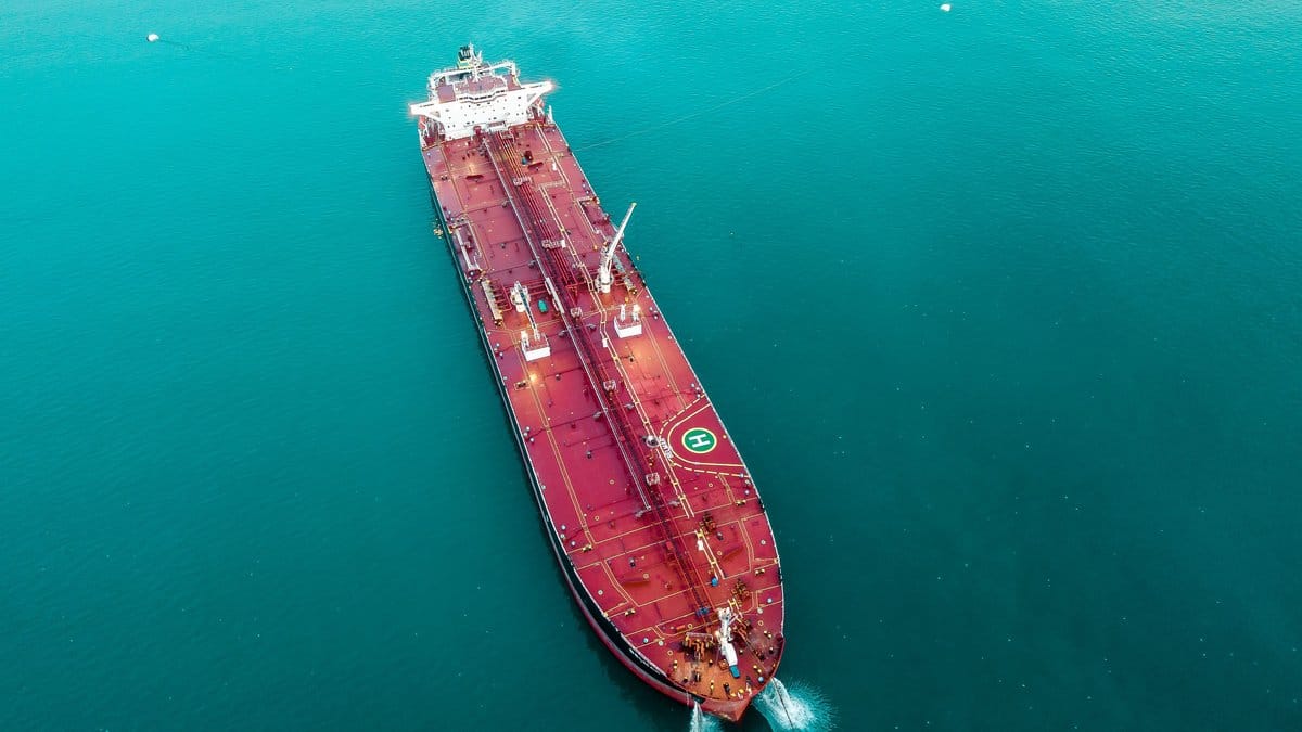 Aerial view of an oil tanker at sea, representing the reopening of the Strait of Hormuz shipping route