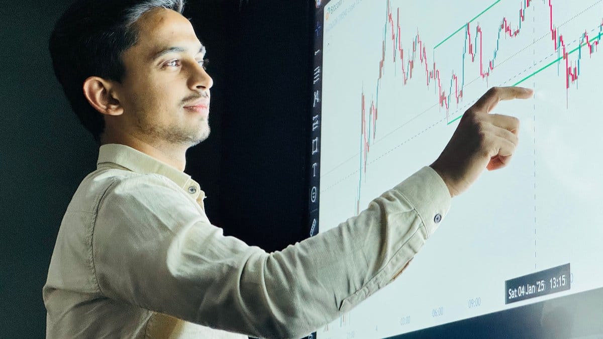 Financial analyst reviewing stock market charts during the July 2026 market session