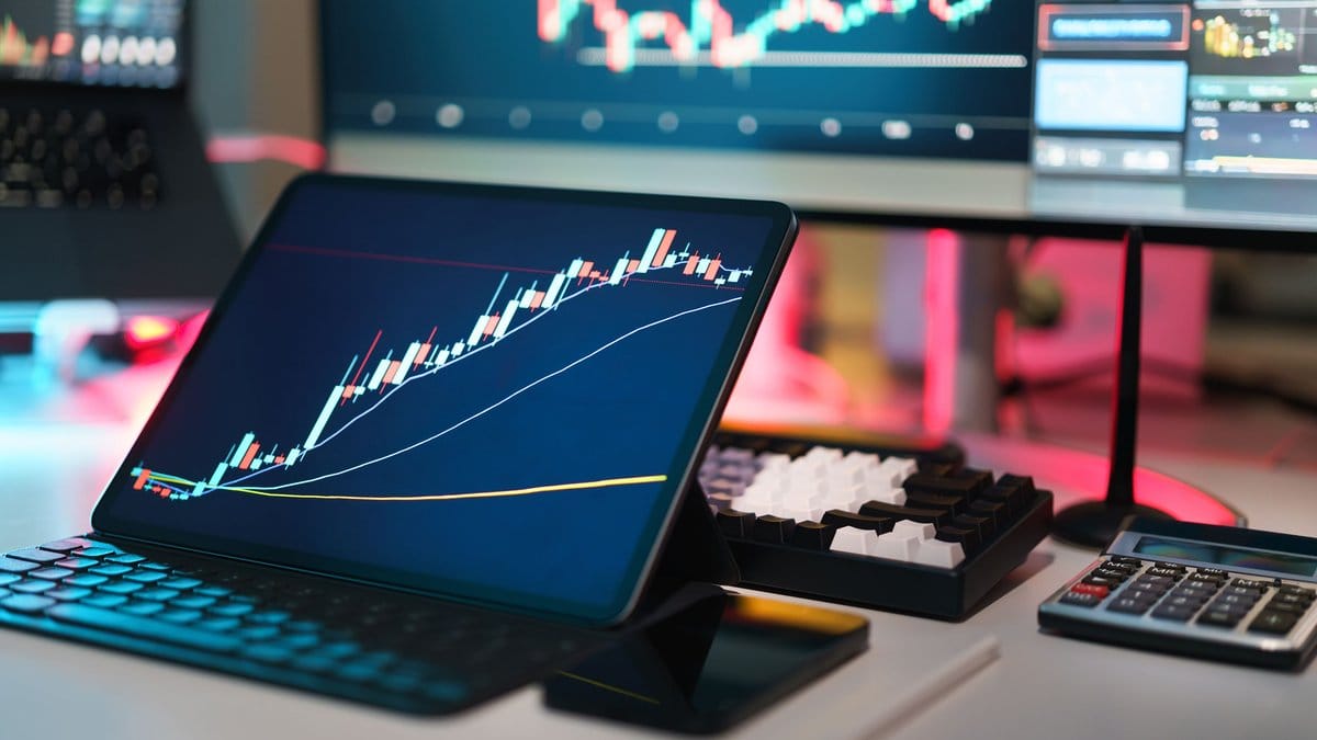 Financial trading desk with market charts for the July 21, 2026 Daily Market Report