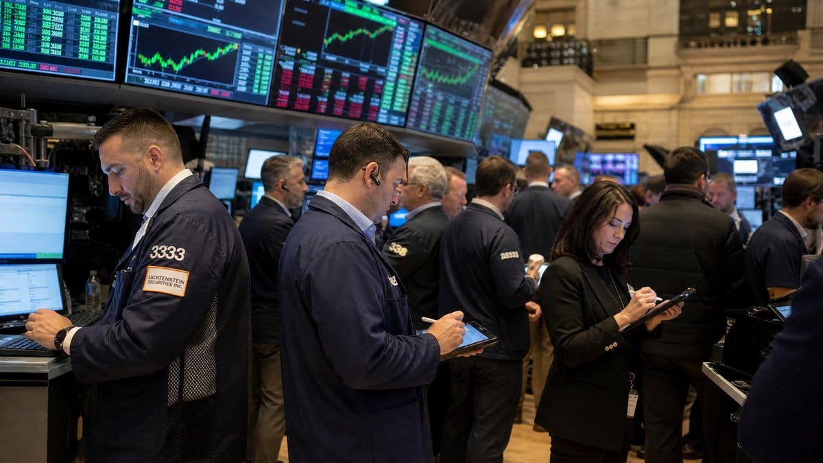 Traders on the NYSE floor during an active session as tech stocks surge on July 31, 2026