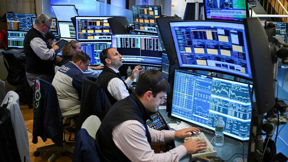 NYSE traders monitoring stock market screens during mixed session on July 29, 2026