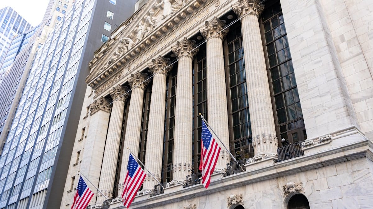 New York Stock Exchange building with American flags — Daily Market Report August 6, 2026