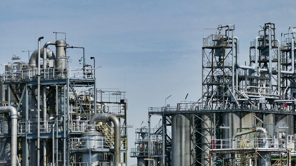 Industrial oil refinery infrastructure illustrating the energy market and crude oil supply theme