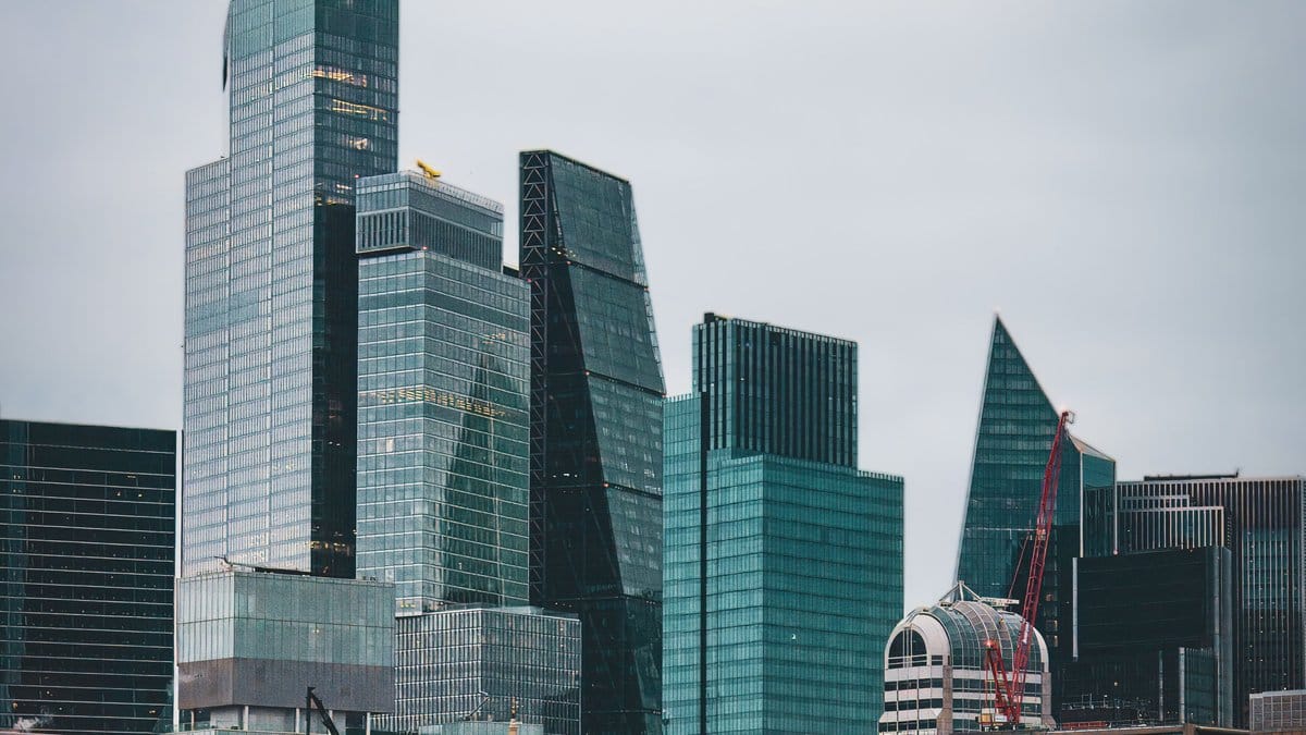 Modern financial district skyline illustrating global markets and capital flows