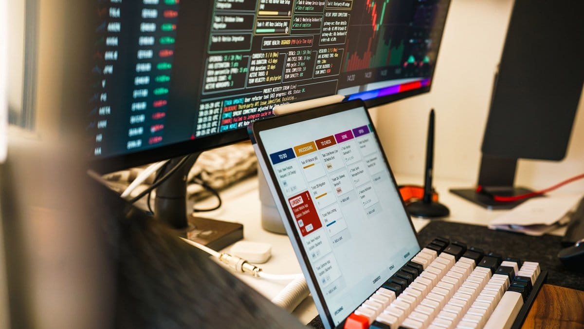 Analyst workstation with live trading screens monitoring the digital asset market