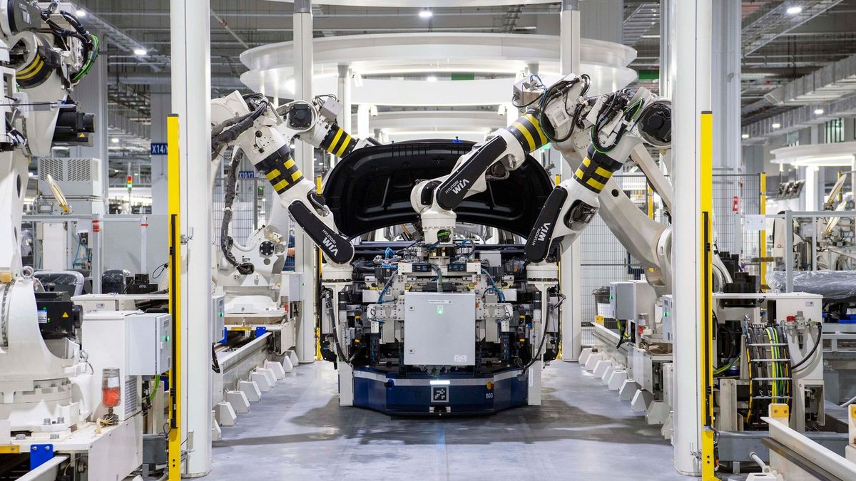 Robotic automotive assembly illustrating the vehicle-production backdrop for platinum and palladium demand